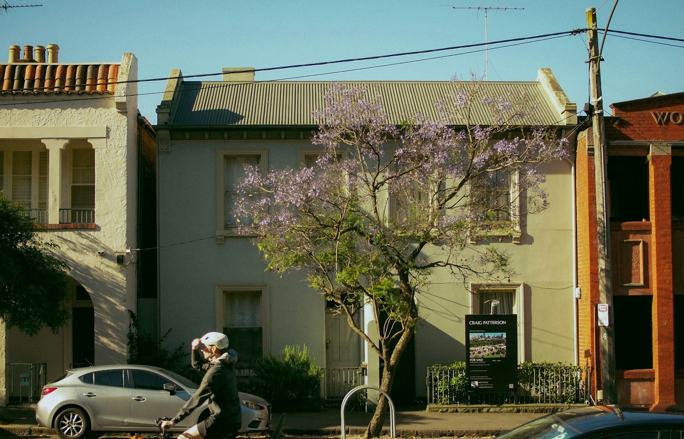 Equity Tap first mortgage finance: Melbourne homes with a for sale sign